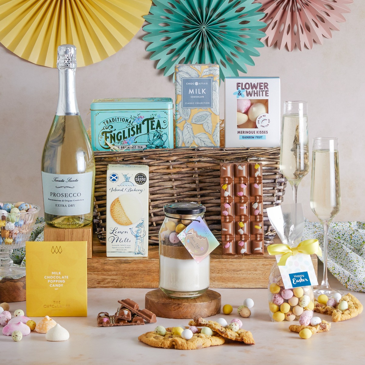 Easter Treats Basket with Prosecco and sweet treats on display