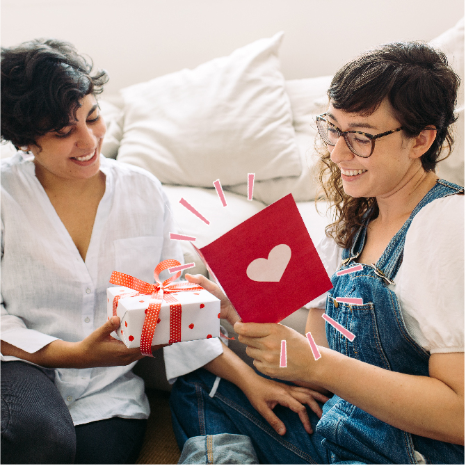 Photo of two people reading a valentine's card