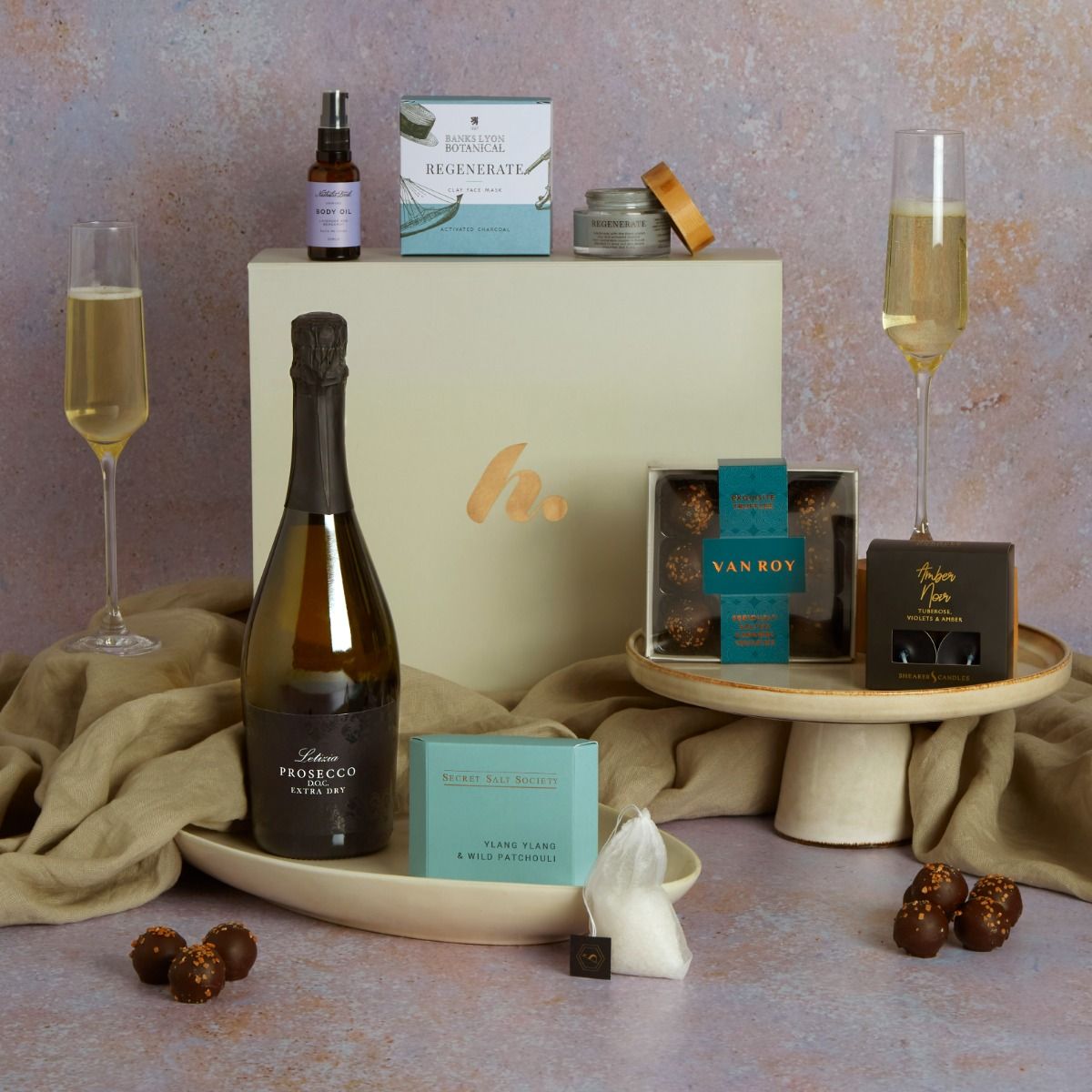Valentine's Pamper Hamper for Two with contents on display and signature gift box