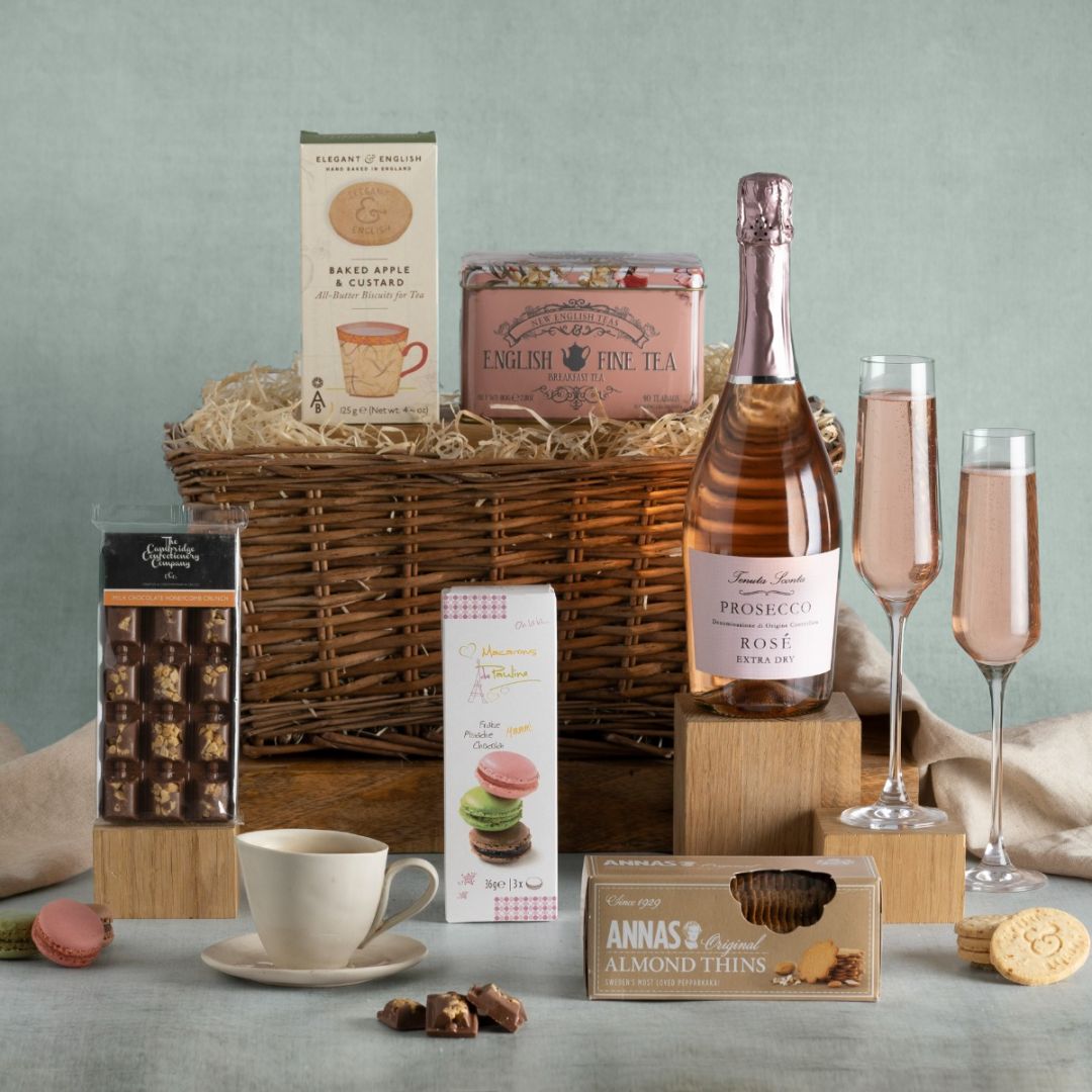 Couples sharing hamper with contents on display