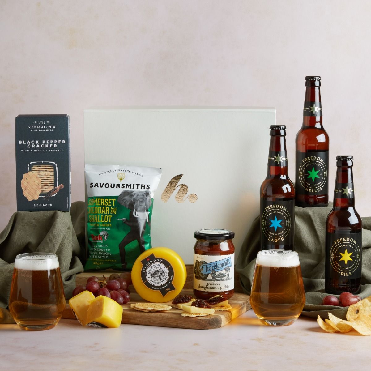 Craft Beer and Cheese Hamper with contents on display and signature gift box