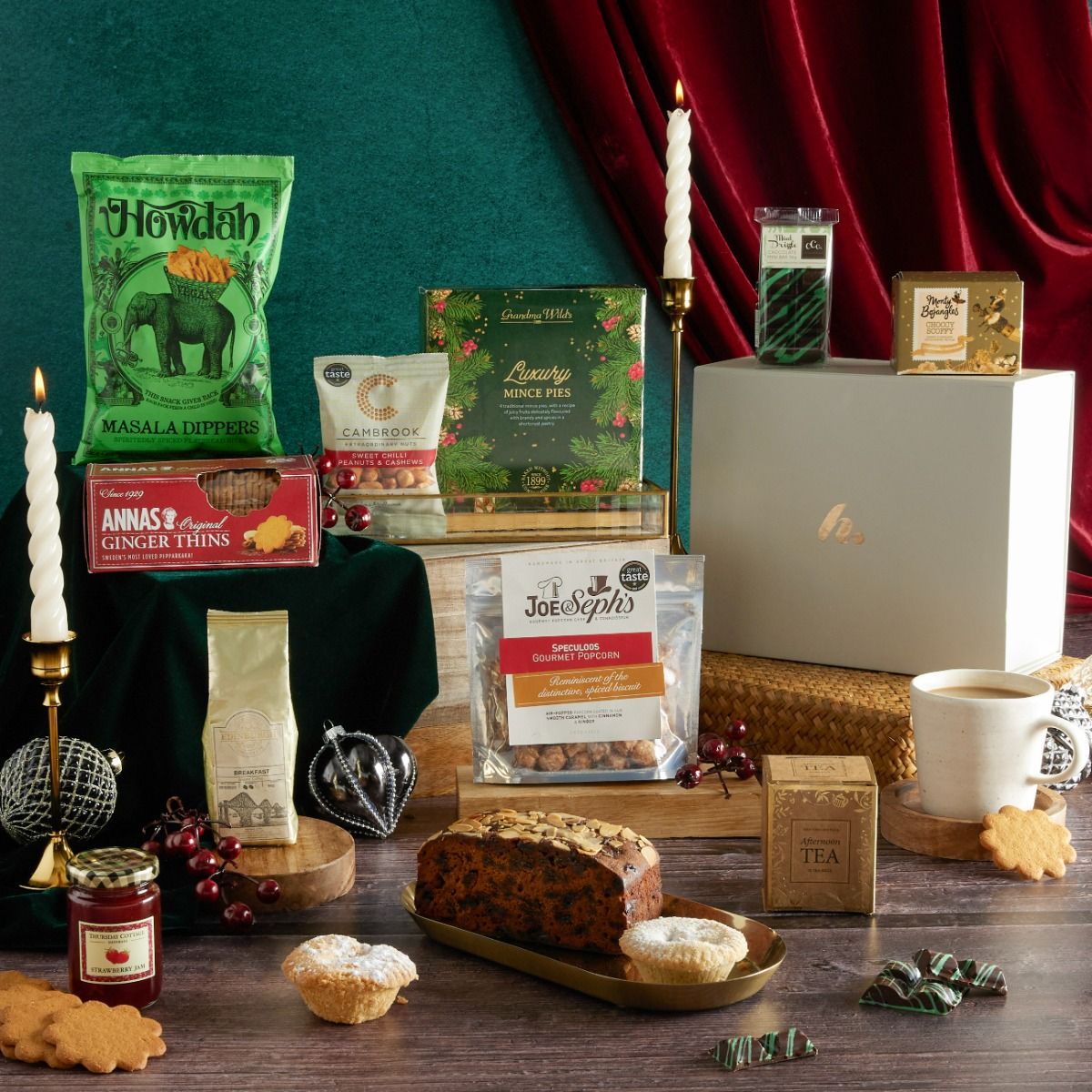 The Bearing Gifts Christmas Hamper with contents on display