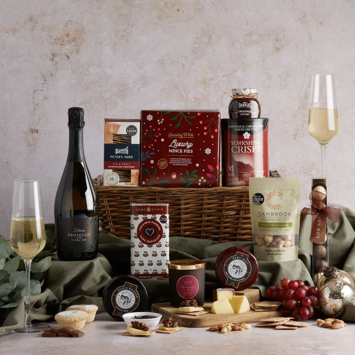 Couples Christmas Sharing Hamper with all of its contents on display, including a open wicker basket