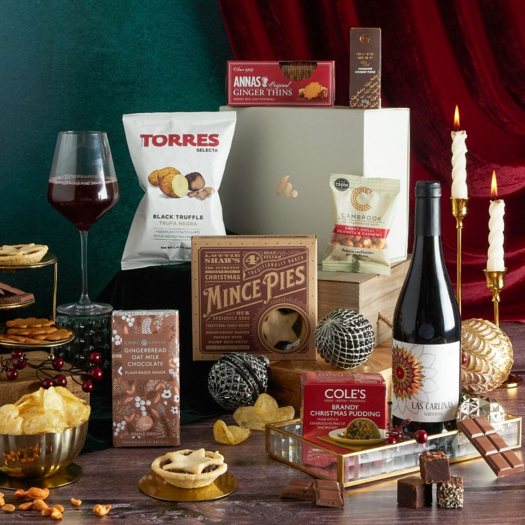 Red Wine & Festive Treats Hamper with vegan Christmas treats on display