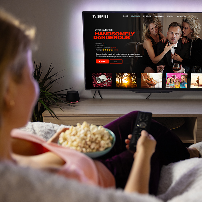 A photo of popcorn and a tv streaming service