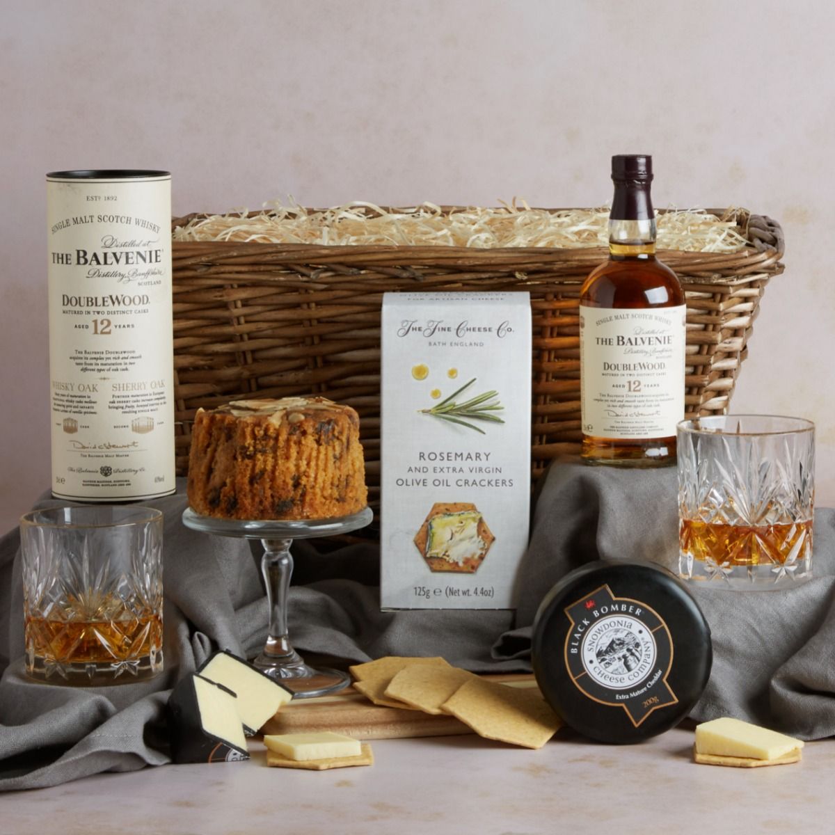 Premium Whisky and Food Gift Basket with contents on display including a bottle of Balvenie
