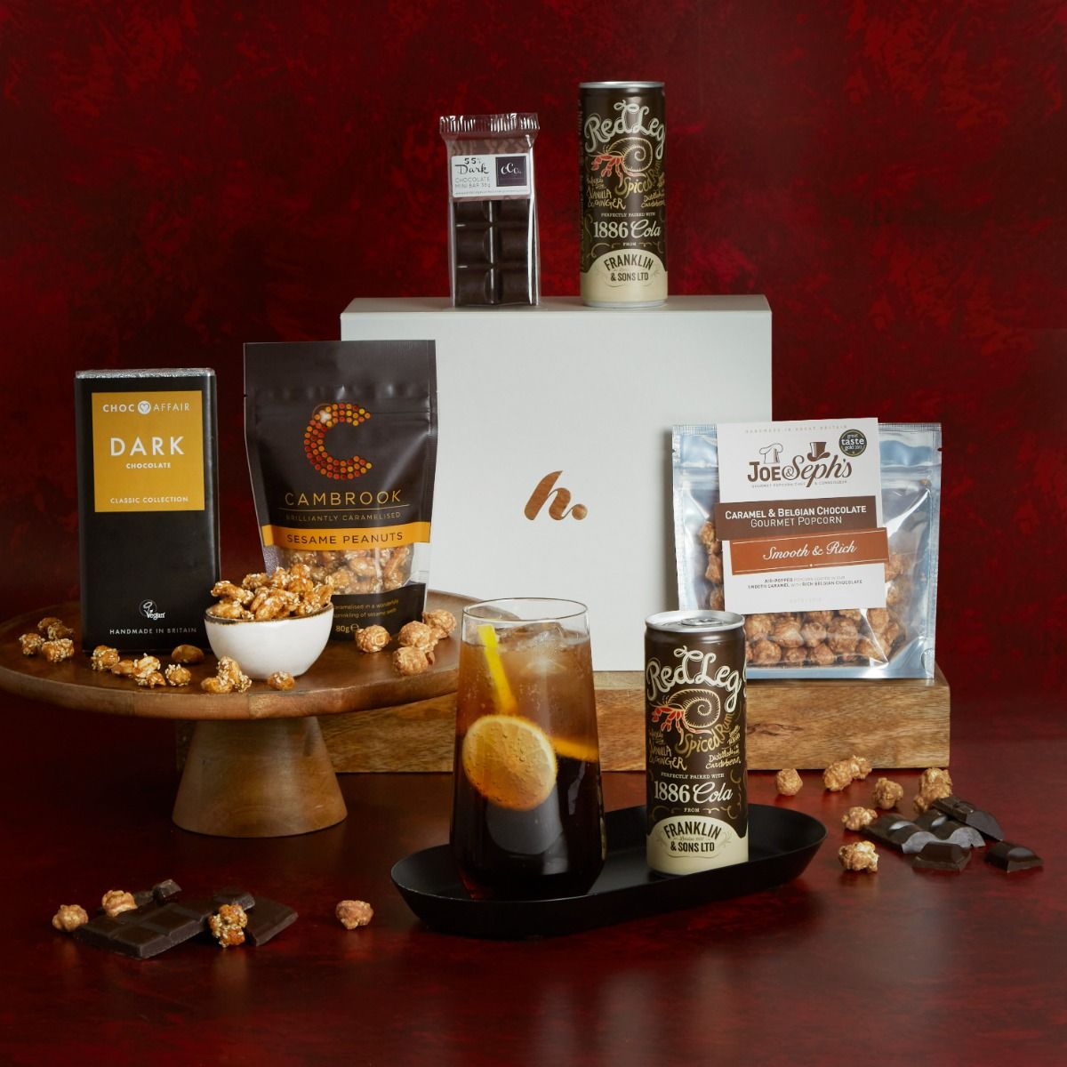 Rum & Treat Hamper with contents on display