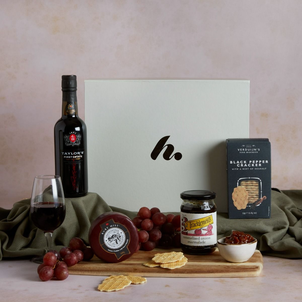 Premium port & cheese hamper with contents on display and signature gift box