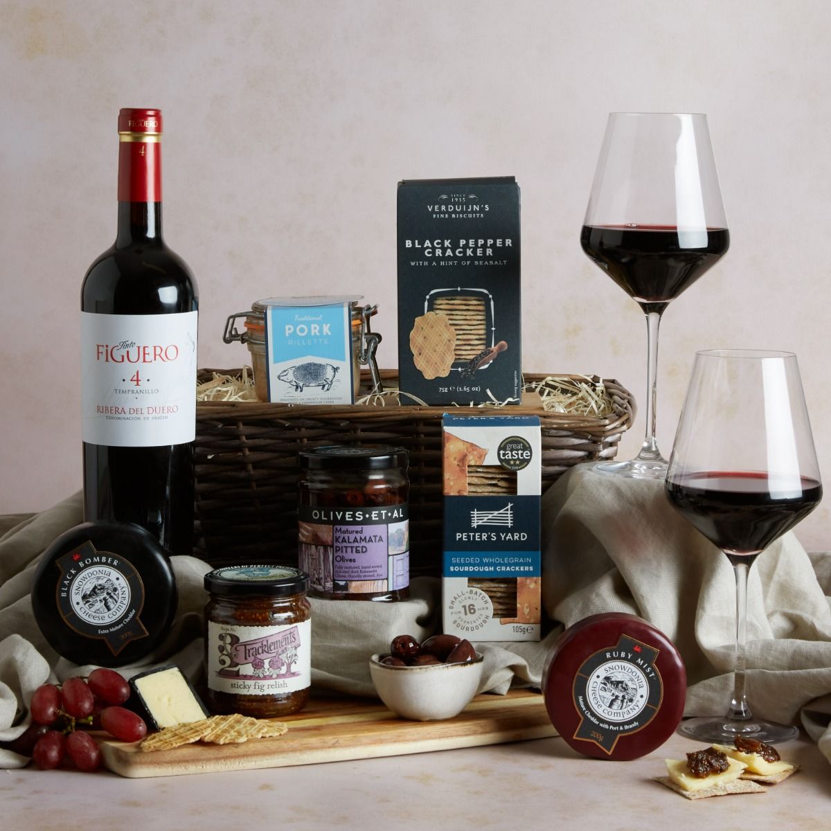 Luxury wine, cheese & rillette hamper with contents on display