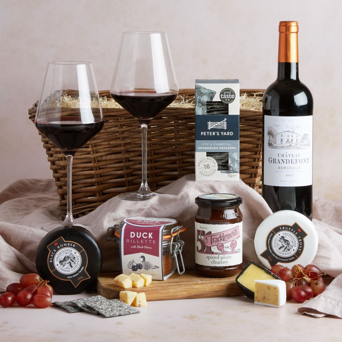 The Wine, Truffle Cheese & Duck Rillette gift set hamper with contents on display