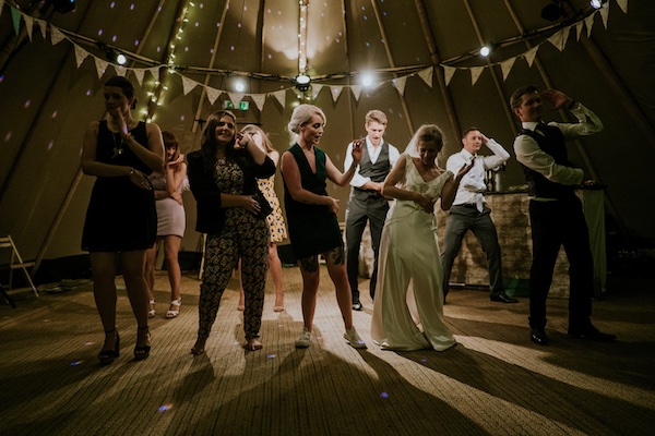 image of wedding guests dancing 